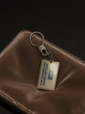 Porte-clés publicitaire vintage INDUSTRIAS ESTEBAN S.A. rétro rectangulaire
