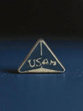 Pin's ancien USAM triangle bleu vintage badge rétro publicitaire