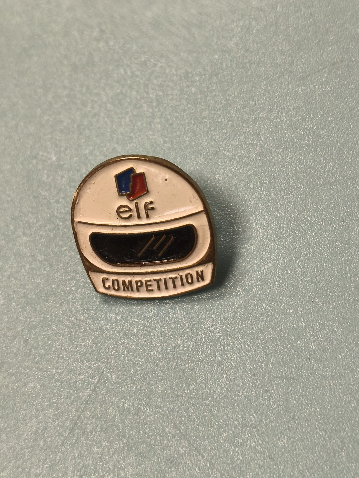 Vintage pin's elf casque compétition auto moto ancien collection (Ref 2)