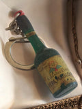 Porte-clés bouteille Calvados Père Magloire vintage France pub alcool