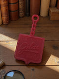 Porte-clés publicitaire vintage Gilac rouge, plastique, années 60-70