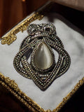 Pendentif vintage fantaisie style art déco, cabochon nacré, bijou ancien