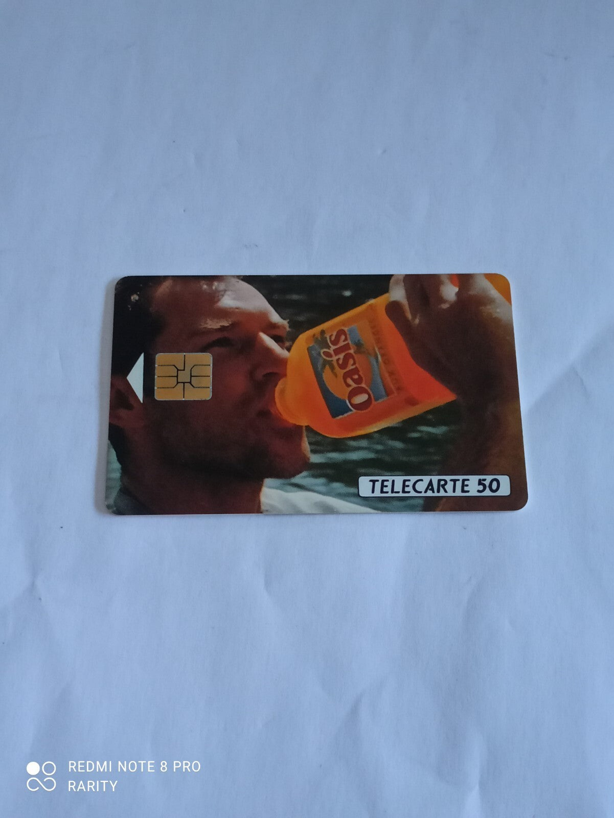 Carte téléphonique publicitaire Oasis vintage 90s, visuel boisson, Télécarte 50