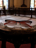 Lunettes vintage Thierry Mugler demi-cerclées, monture noire et branches rouges