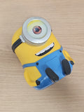 Tirelire Minion jaune bleue à œil unique, figurine déco d’occasion