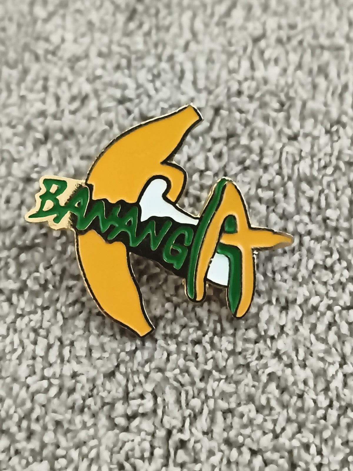 Pin's vintage Banania jaune vert logo publicitaire ancien (Ref 2)