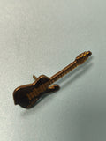 Pin's vintage guitare noire, forme électrique, collection musique rock