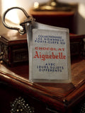 Porte-clés publicitaire vintage Chocolat Aiguebelle, ancien, plaque translucide