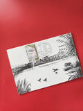 Carte postale philatélie paysage noir et blanc avec timbre cigogne