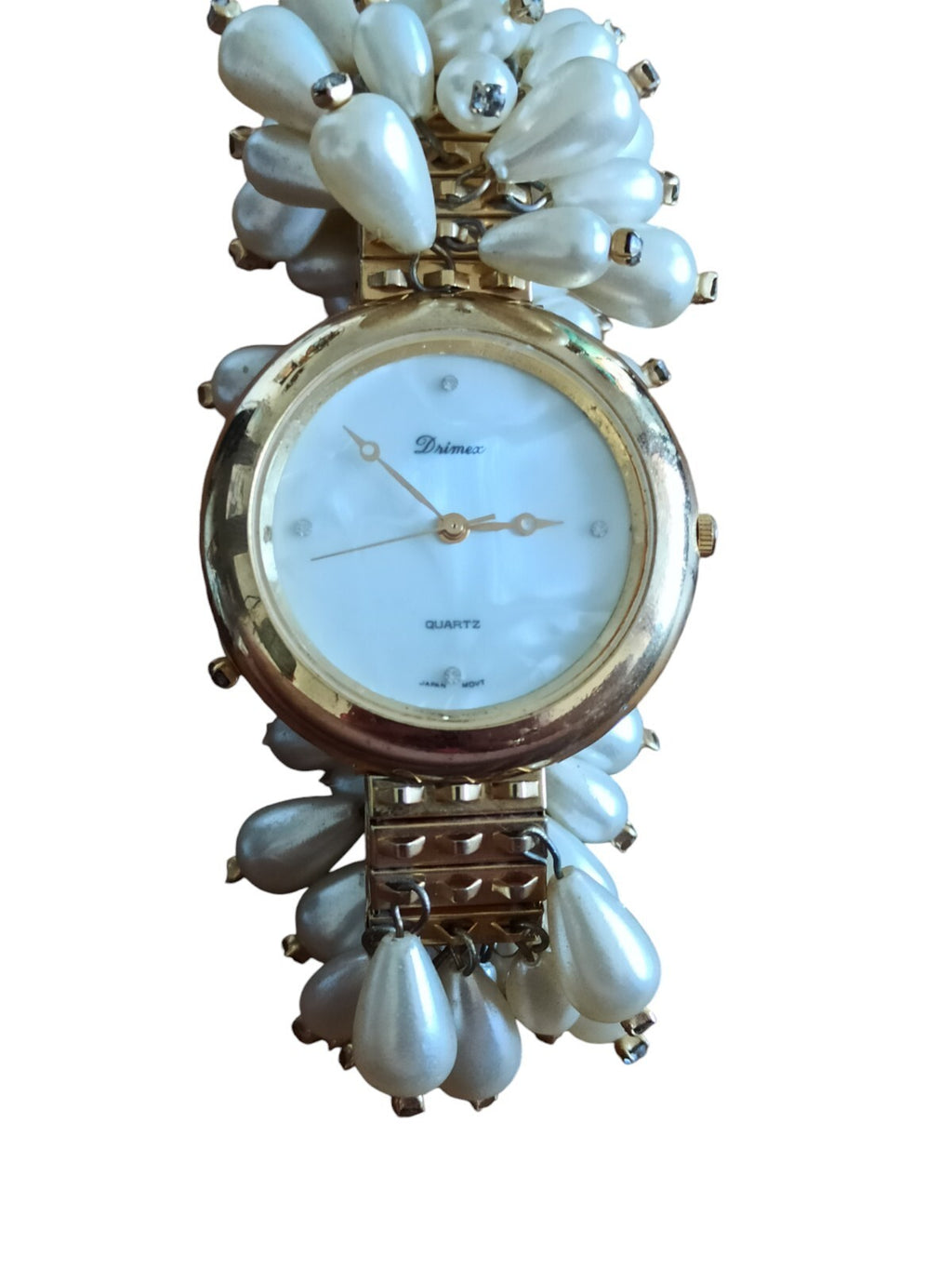 Montre femme Drimex bracelet perles nacrées doré cadran blanc élégant