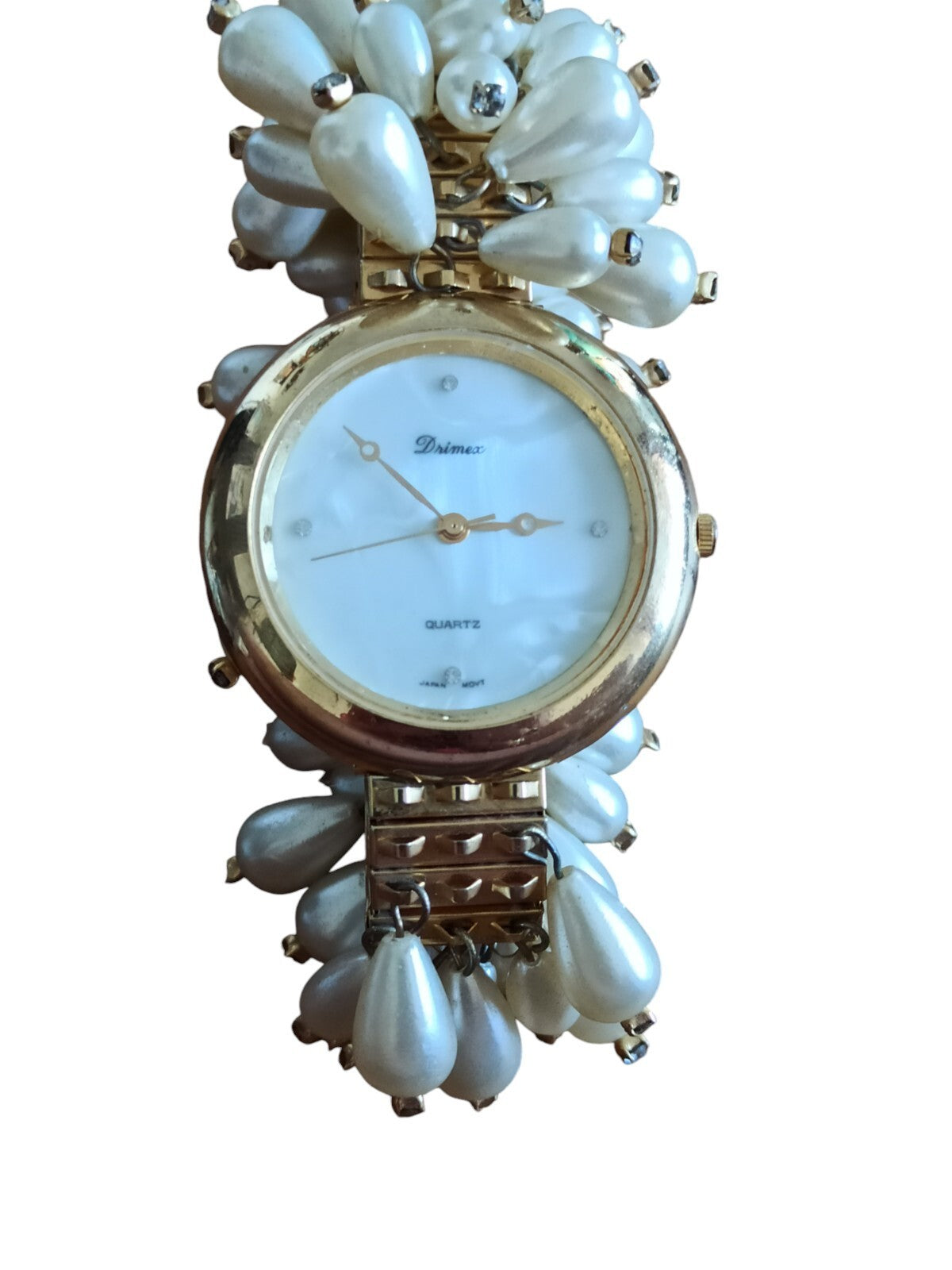 Montre femme Drimex bracelet perles nacrées doré cadran blanc élégant