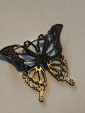 Broche papillon vintage, finition métallique ajourée, bijou rétro