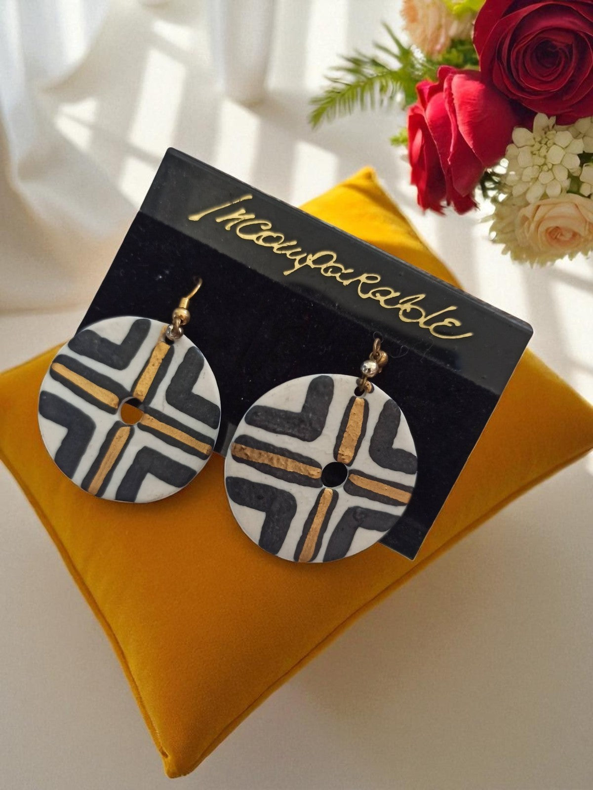Boucles d’oreilles vintage Incomparable rondes motif graphique noir or