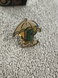 Pin's vintage personnage poubelle verte parapluie, dessin animé, émaillé (Ref 11