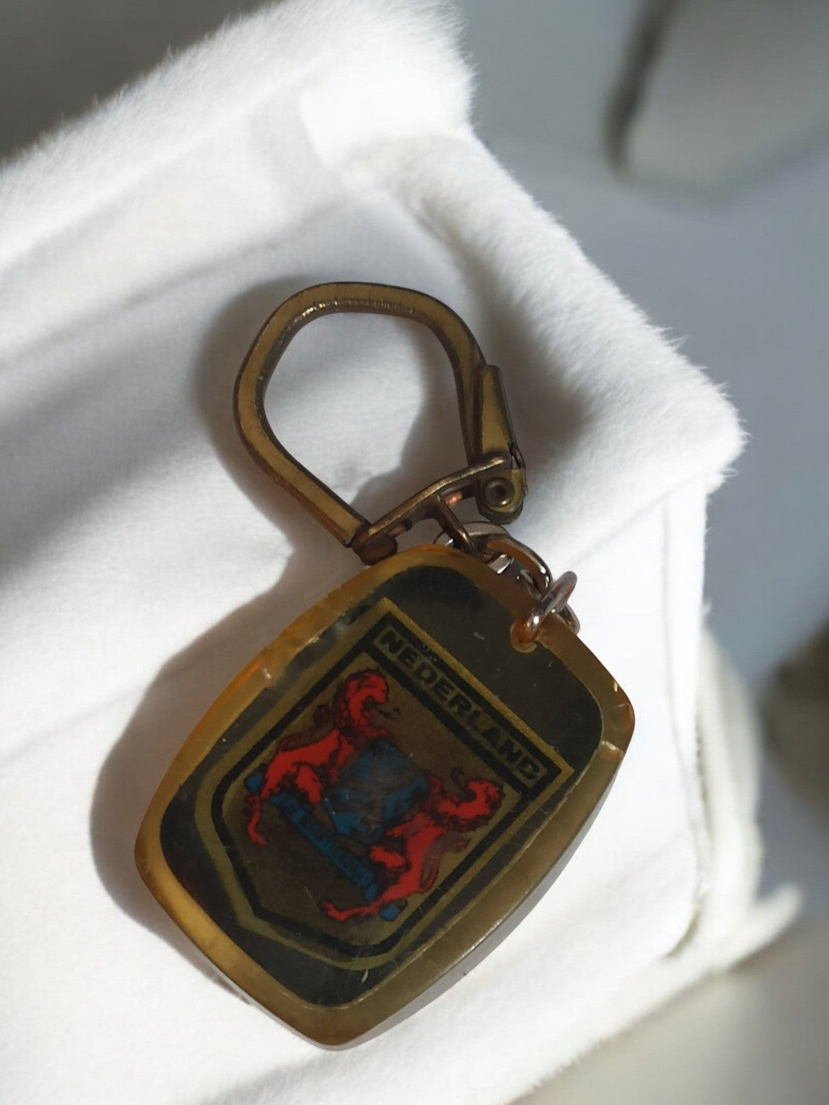 Porte-clés ancien Nederland blason rétro vintage objet publicitaire