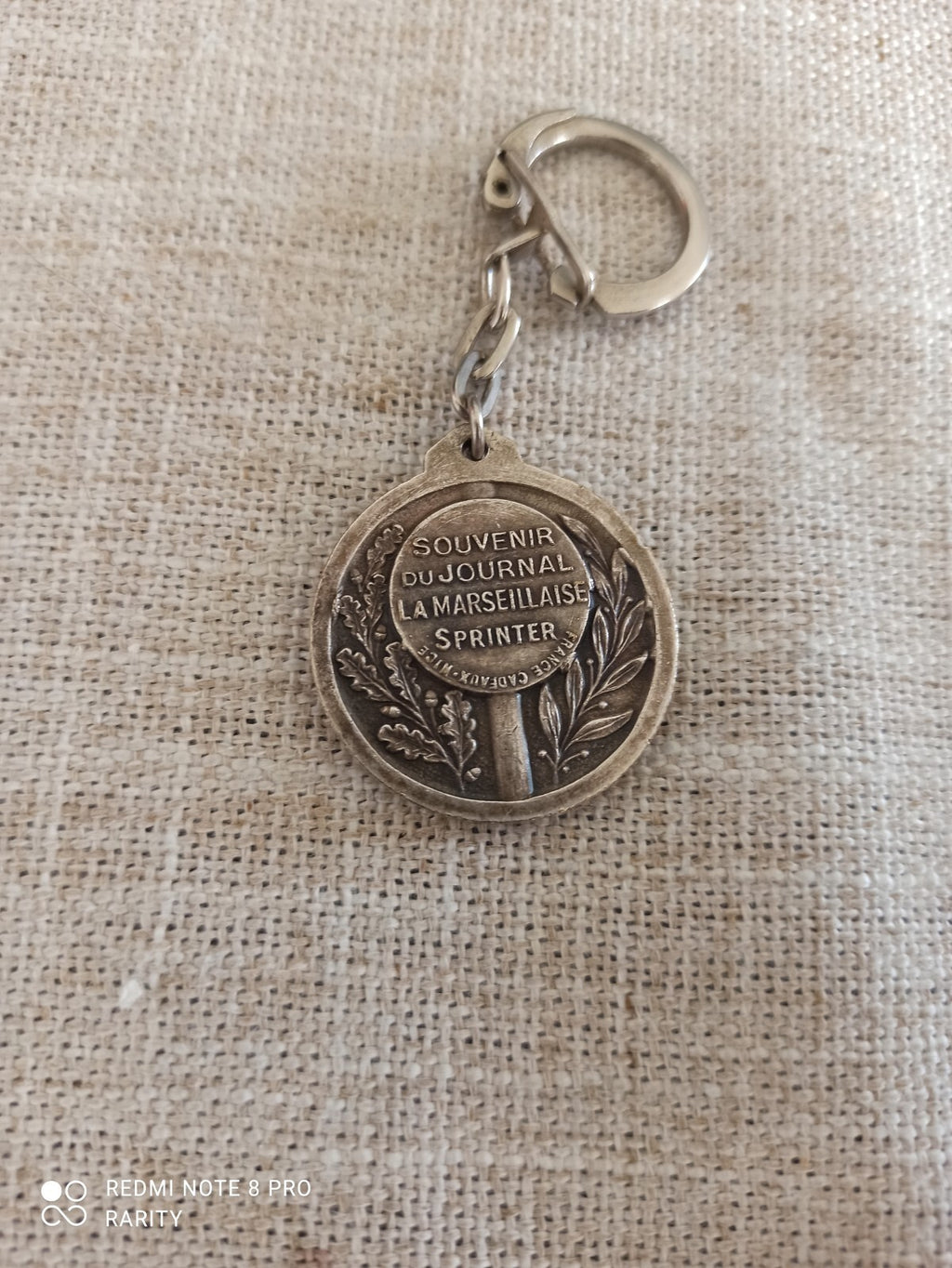 Porte-clés vintage Jeux Olympiques anneau chaîne La Marseillaise sprinter
