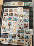 Lot timbres mondiaux thématiques animaux sports faune flore Asie couleurs vives