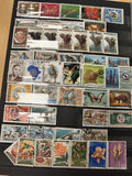 Lot de timbres Côte d'Ivoire thématiques animaux fleurs oblitérés multicolores