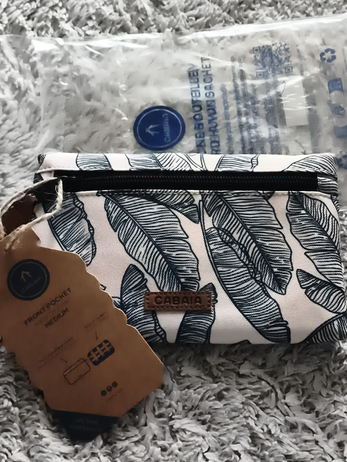 Trousse Cabaia à motif feuilles bleues, pochette zippée 18 cm neuve