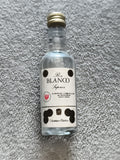 Mignonnette Ron Blanco Superior vintage, bouteille miniature partiellement plein