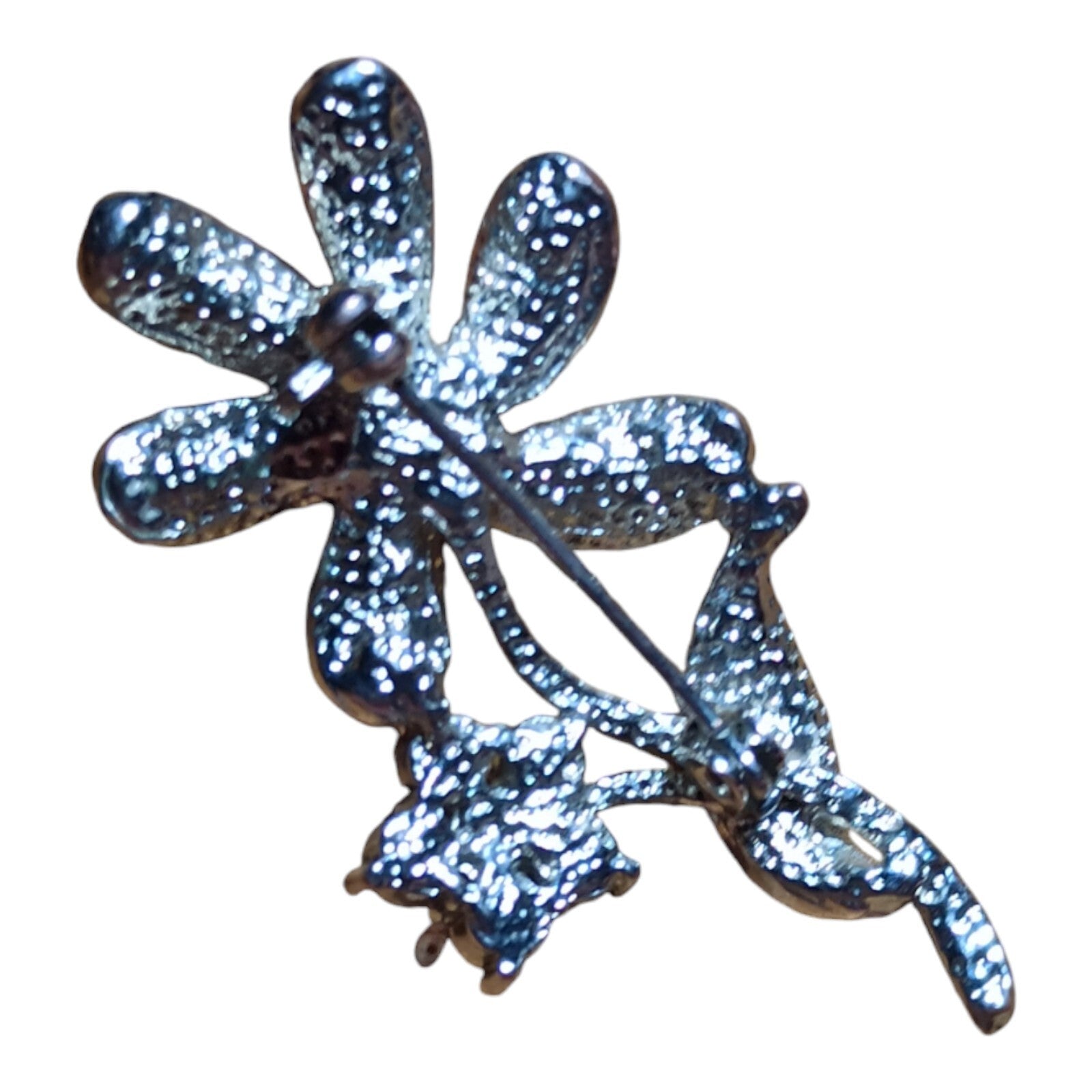 Broche fleur vintage argentée Art Déco strass violets perle centrale