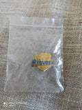 Pin's Le Provençal émail doré vintage neuf logo presse badge