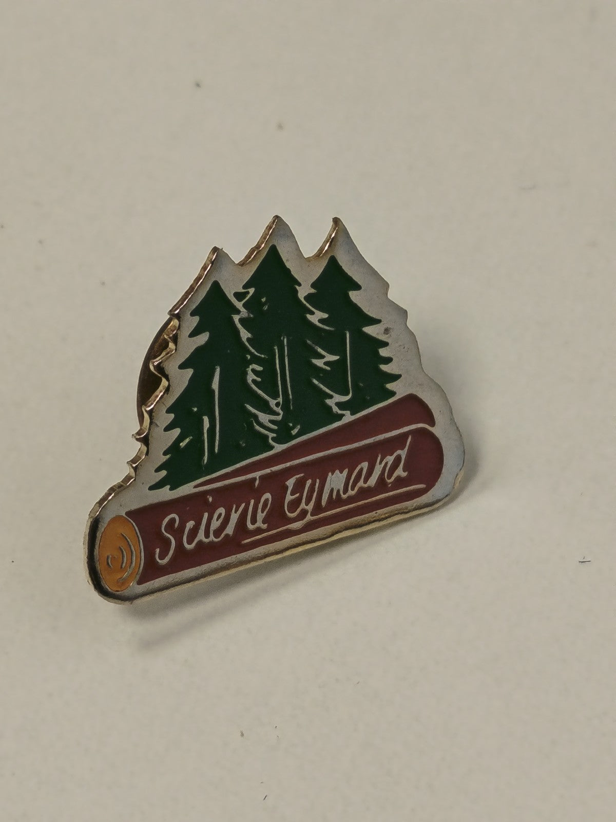 Pin's ancien rétro Scierie Eymard ? badge collection vintage bois industrie Fran