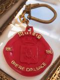 Porte-clés publicitaire Mutzig bière d?Alsace vintage rouge France