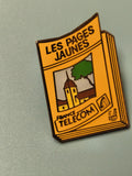Pin's vintage Les Pages Jaunes France Télécom ancien logo livre jaune collection