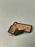 Pin's vintage Lifetex Wella publicitaire, émail, motif bouteille et plante