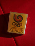 Pin's ancien Xerox Jeux Olympiques logo vintage publicitaire rétro carré