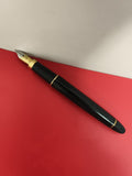 Stylo plume ancien noir finition dorée vintage plume orné