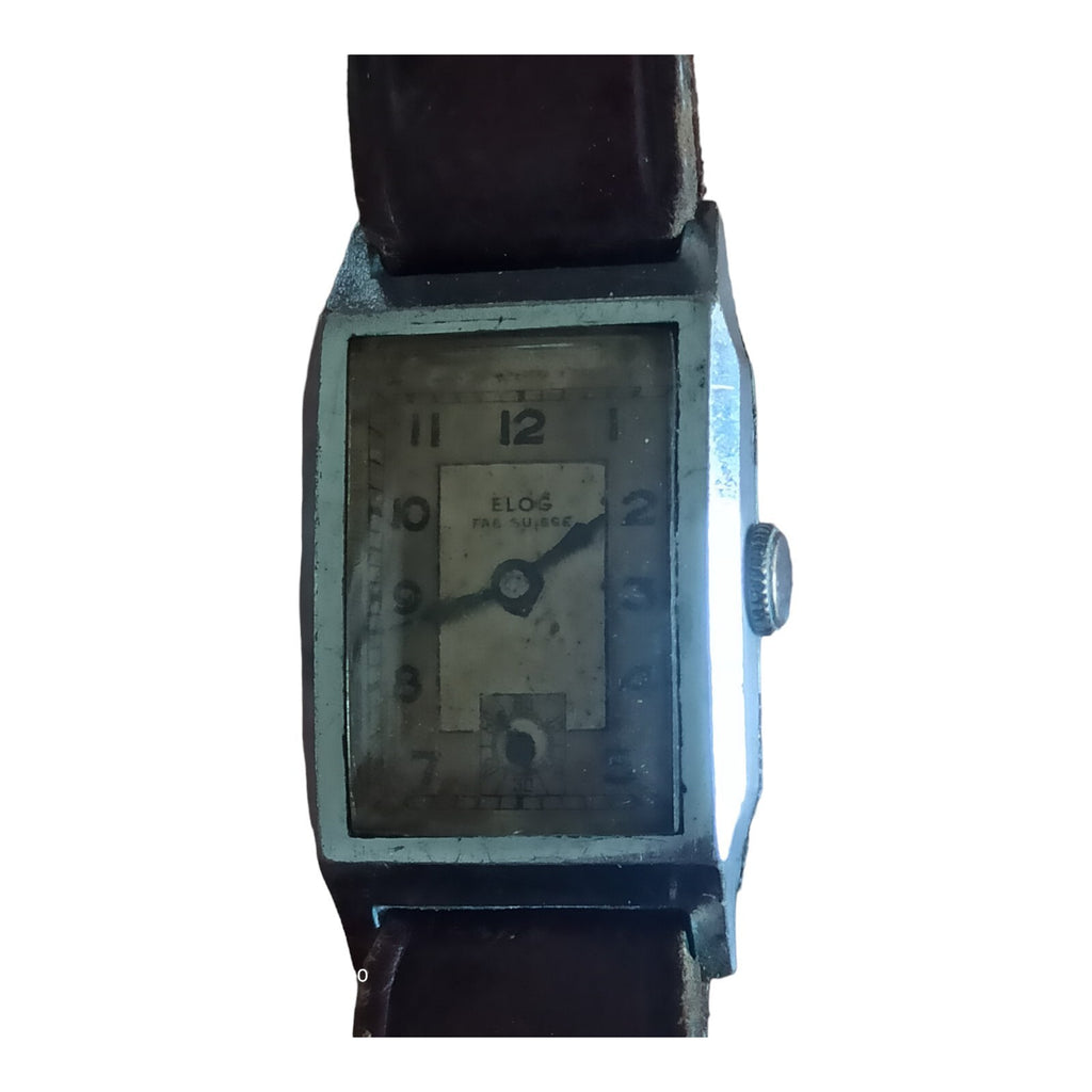 Montre rectangulaire vintage Elog Suisse mécanique cadran patiné, bracelet brun