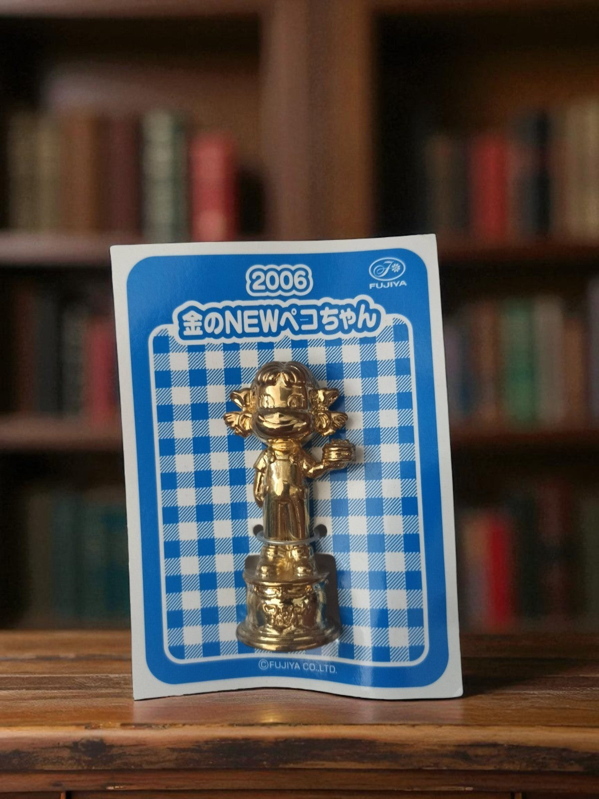 Trophée mini figurine dorée Peko Chan Fujiya 2006 édition limitée Japon