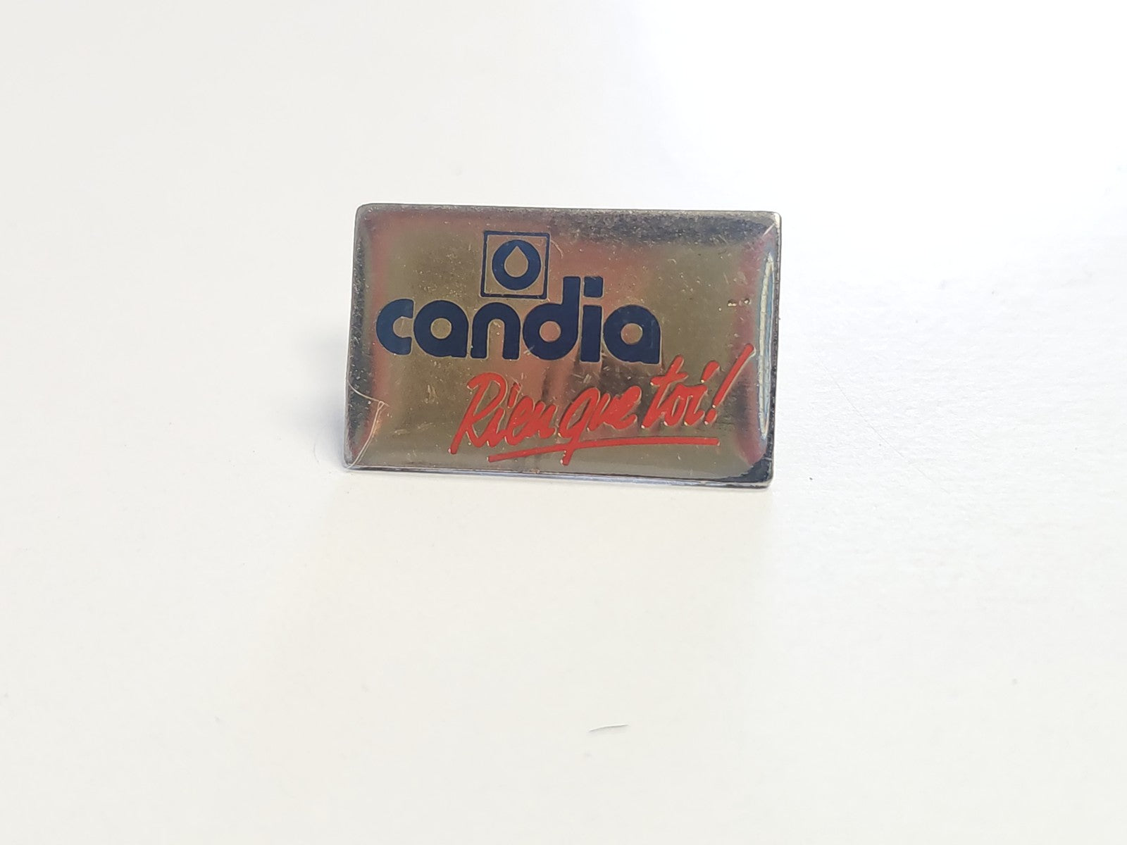 Pin's rétro Candia ancien badge publicitaire vintage collection laiterie France