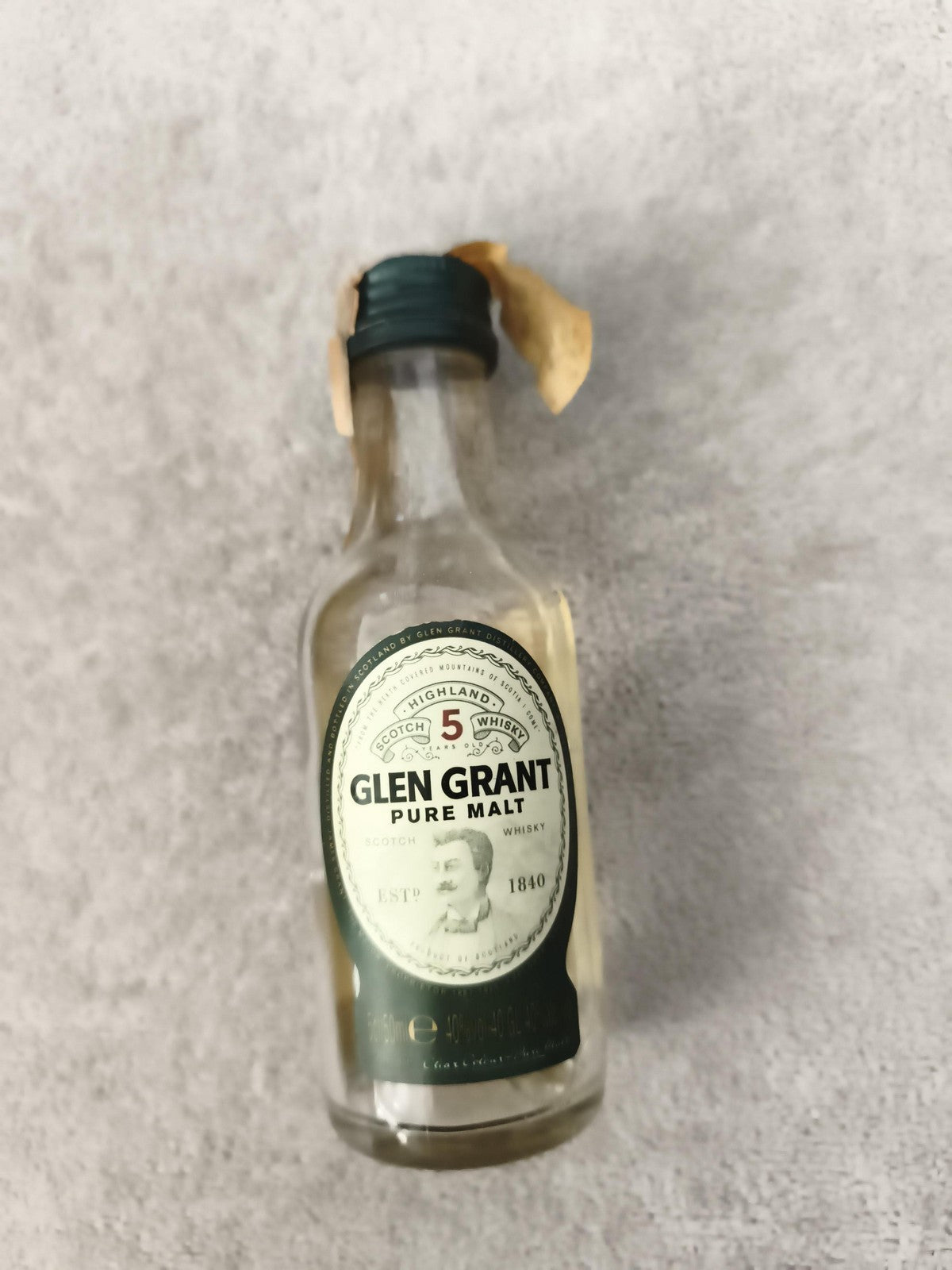 Miniature whisky Glen Grant Pure Malt 5 ans bouteille partiellement remplie
