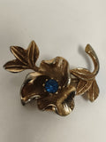 Broche ancienne fleur dorée pierre bleue vintage épingle bijou rétro