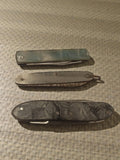 Couteaux suisses anciens vintage lot de 3 années 70 manche marbré collection