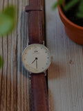 Montre femme Daniel Wellington vintage cadran strass à restaurer marron