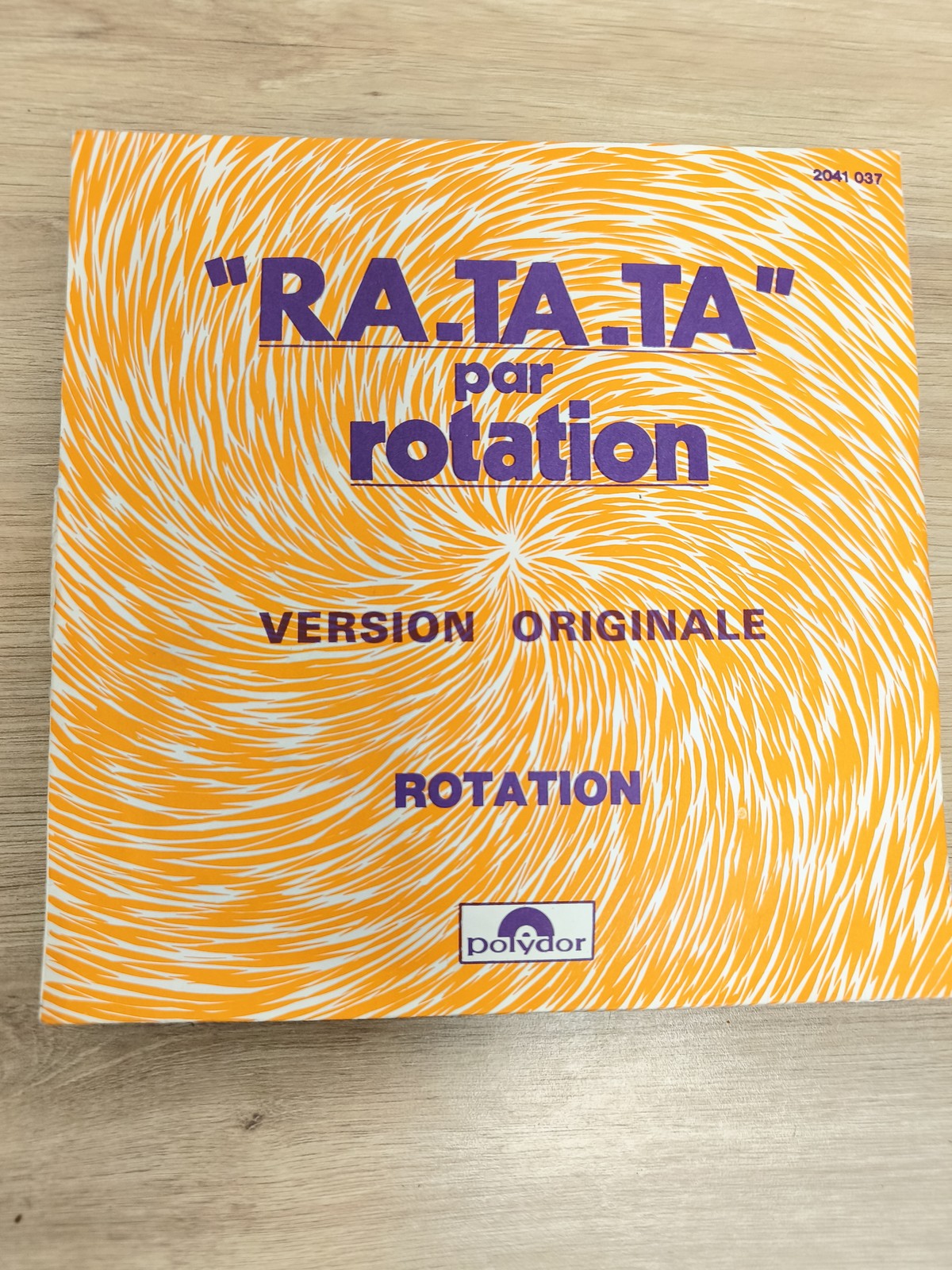 Vinyle 45 tours "RA.TA.TA" Rotation Polydor pochette orange spiralée