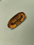 Vintage pin's NOCTUA translucide ambré ancien publicité éclairage (Ref 15)
