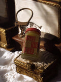 Porte-clés publicitaire vintage bocal miniature verre, rare, déco rétro