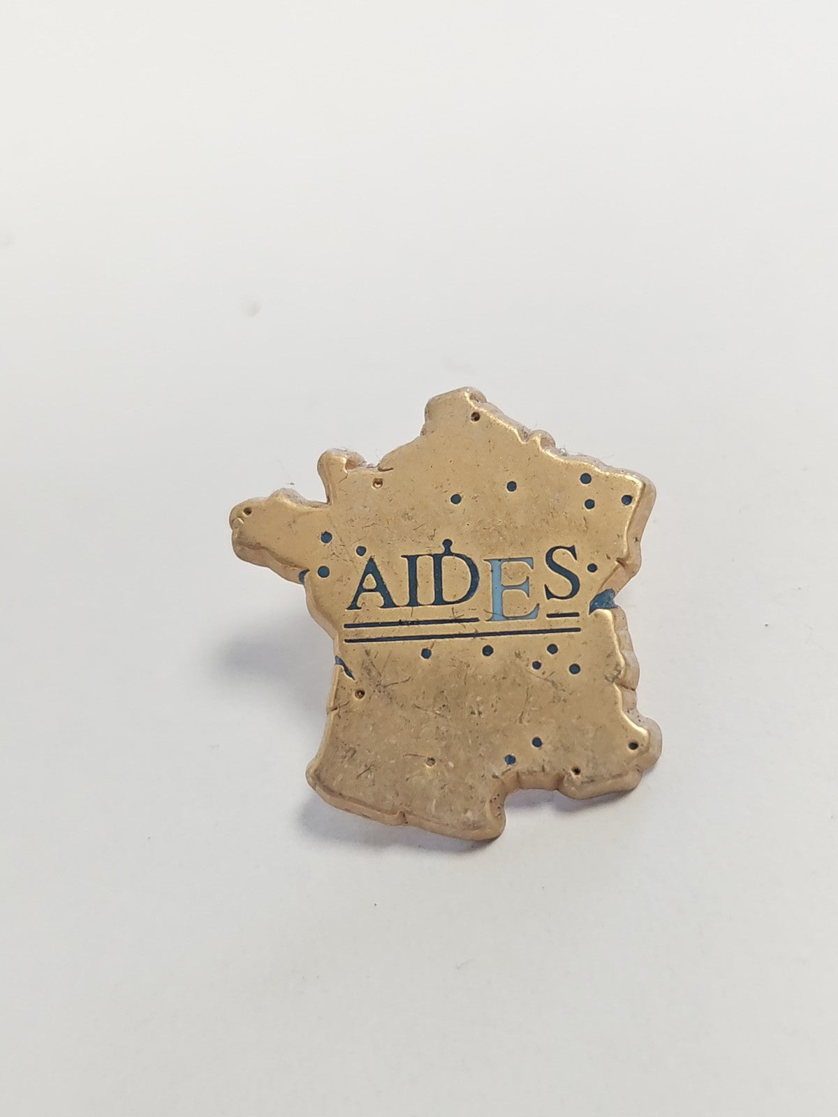 Pin's rétro Aides ancien, badge vintage collection années 80 90 association fran