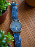 Montre homme vintage cadran bleu effet tissu, bracelet bleu rétro non testée