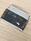 Briquet vintage Silver Match essence, finition noire usée, ancien à recharger