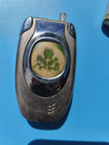 Ancien briquet publicitaire grenouille, état à restaurer, collection vintage