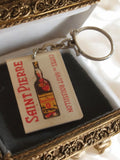 Porte-clés publicitaire vintage Saint Pierre Côtes du Roussillon vin France