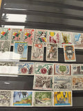 Lot de timbres Cameroun multicolores, motifs variés, oblitérés et neufs