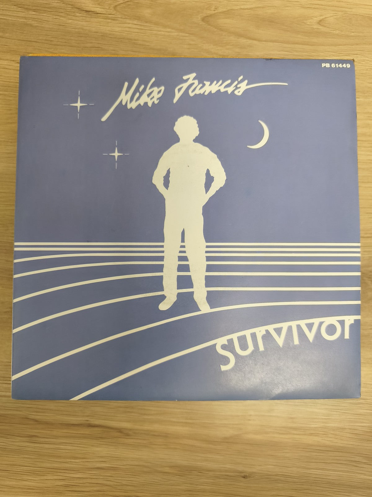 Mike Francis Survivor vinyle 45 tours pochette bleue silhouette blanche