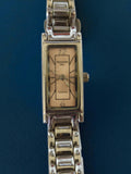 Montre femme Alessandra Olla vintage rectangulaire rétro dorée Firenze